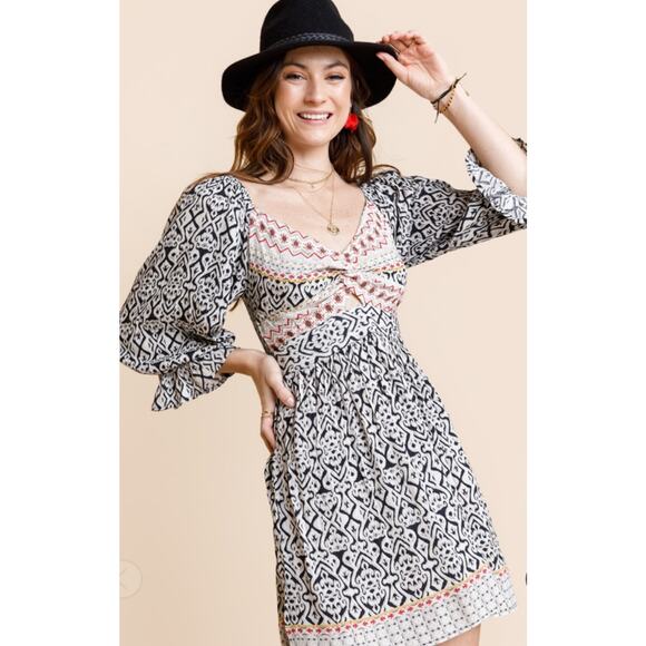 Nostalgia Dresses & Skirts - Nostalgia Women's Dress Size M Black IKAT Print Open Twist Front Smocked